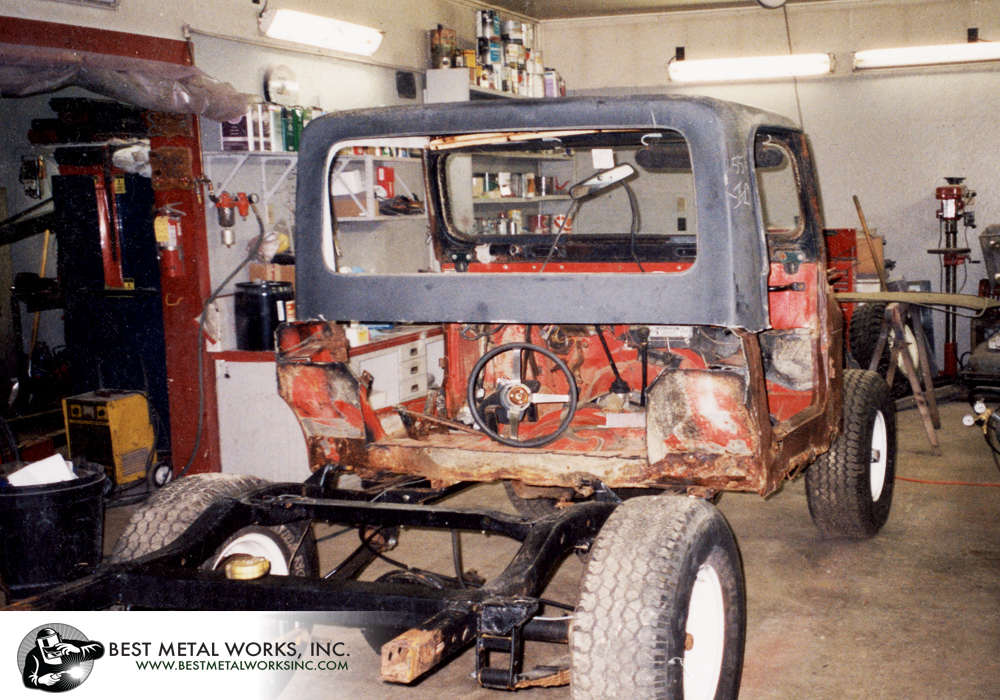 A Jeep Scrambler frame, a rusted CJ 7 tub, and a pile of pieces were converted into a Jeep pickup truck.